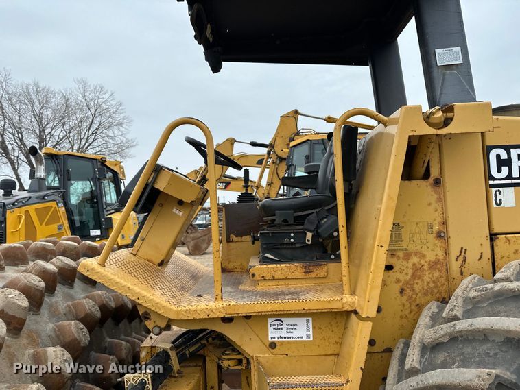 image for item DQ0599 1999 Caterpillar  CP-563C single drum vibratory roller