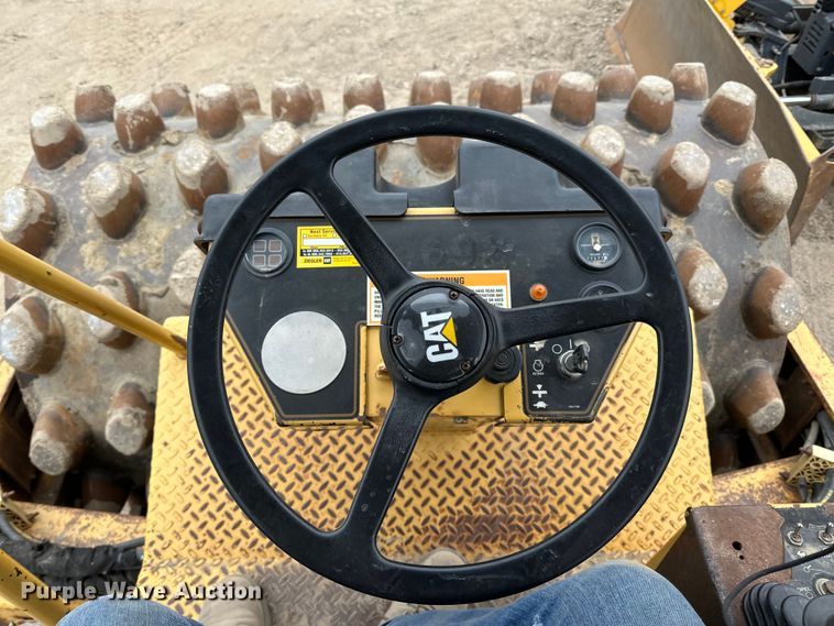 image for item DQ0599 1999 Caterpillar  CP-563C single drum vibratory roller