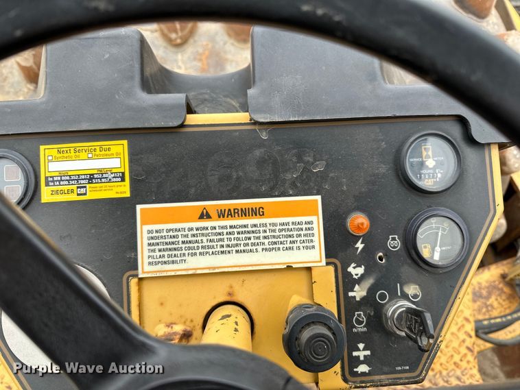 image for item DQ0599 1999 Caterpillar  CP-563C single drum vibratory roller