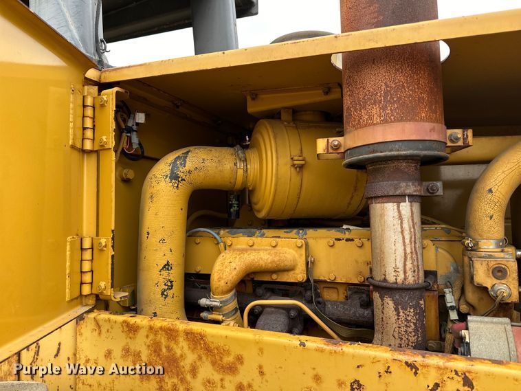 image for item DQ0599 1999 Caterpillar  CP-563C single drum vibratory roller