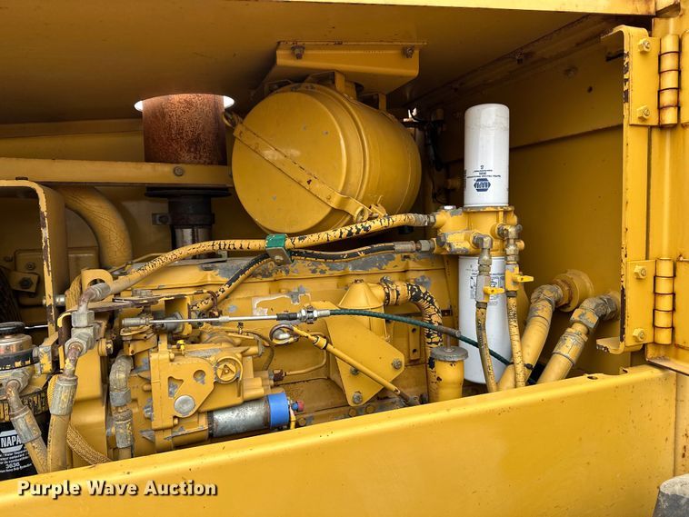 image for item DQ0599 1999 Caterpillar  CP-563C single drum vibratory roller