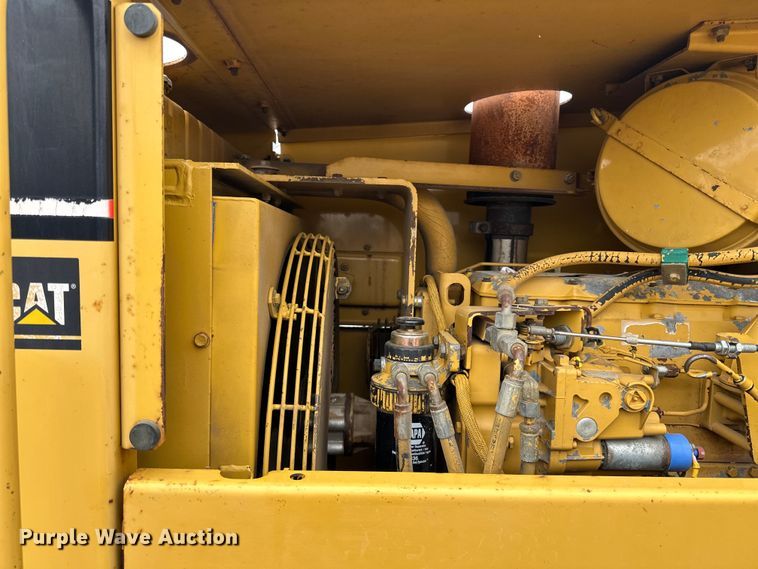 image for item DQ0599 1999 Caterpillar  CP-563C single drum vibratory roller