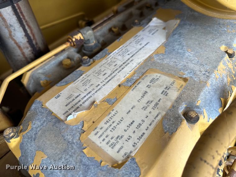 image for item DQ0599 1999 Caterpillar  CP-563C single drum vibratory roller