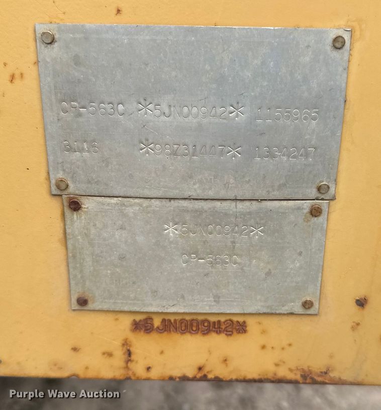 image for item DQ0599 1999 Caterpillar  CP-563C single drum vibratory roller