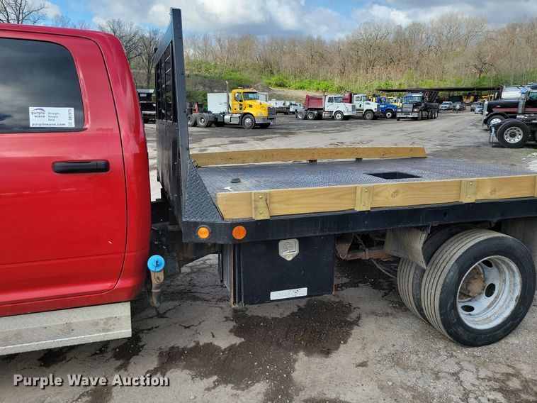 image for item DR7975 2011 Dodge Ram 5500HD Crew Cab flatbed truck