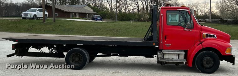 image for item EK4377 2002 Sterling M6500 Acterra rollback truck