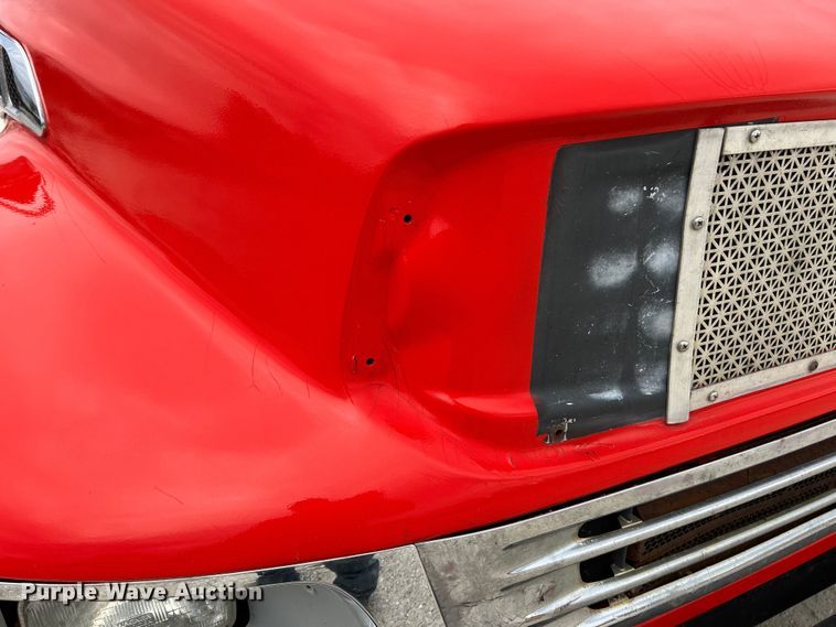 image for item EK4377 2002 Sterling M6500 Acterra rollback truck