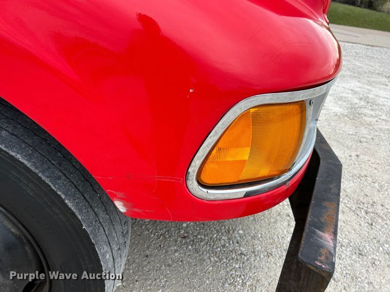 image for item EK4377 2002 Sterling M6500 Acterra rollback truck