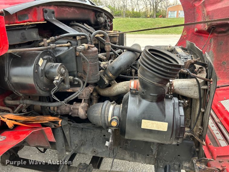 image for item EK4377 2002 Sterling M6500 Acterra rollback truck