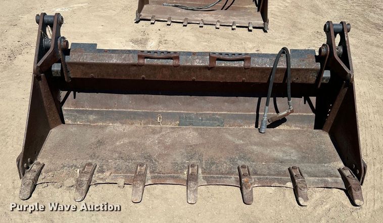 image for item DO1031 4-in1 skid steer bucket