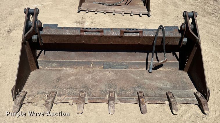 image for item DO1031 4-in1 skid steer bucket