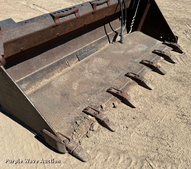 image for item DO1031 4-in1 skid steer bucket