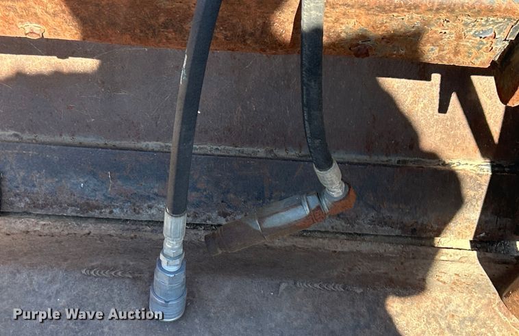 image for item DO1031 4-in1 skid steer bucket