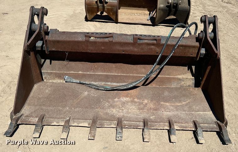 image for item DO1032 4-in1 skid steer bucket