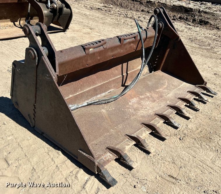 image for item DO1032 4-in1 skid steer bucket