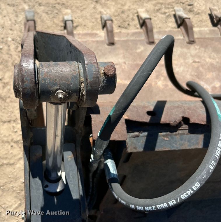 image for item DO1032 4-in1 skid steer bucket