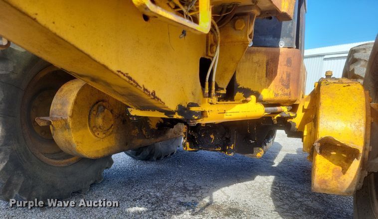 image for item DO4879 1981 John Deere 570A rigid frame motor grader