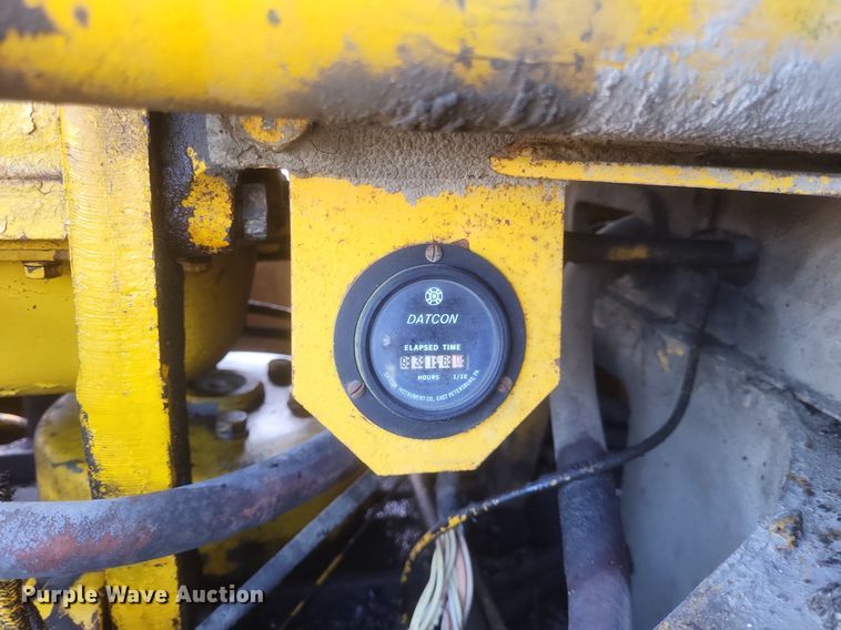 image for item DO4879 1981 John Deere 570A rigid frame motor grader