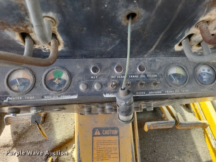 image for item DO4879 1981 John Deere 570A rigid frame motor grader