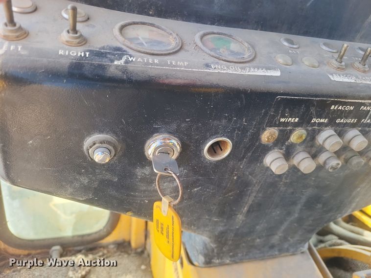 image for item DO4879 1981 John Deere 570A rigid frame motor grader