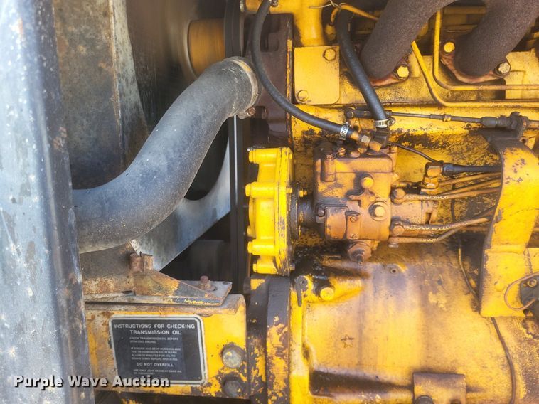 image for item DO4879 1981 John Deere 570A rigid frame motor grader