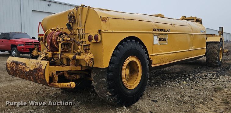 image for item DQ8666 1978 Caterpillar 613B water wagon