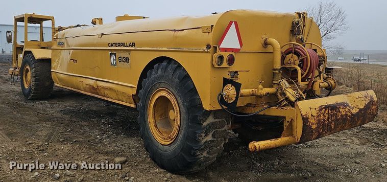 image for item DQ8666 1978 Caterpillar 613B water wagon