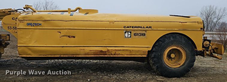 image for item DQ8666 1978 Caterpillar 613B water wagon
