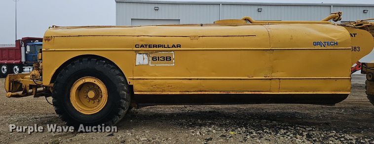 image for item DQ8666 1978 Caterpillar 613B water wagon