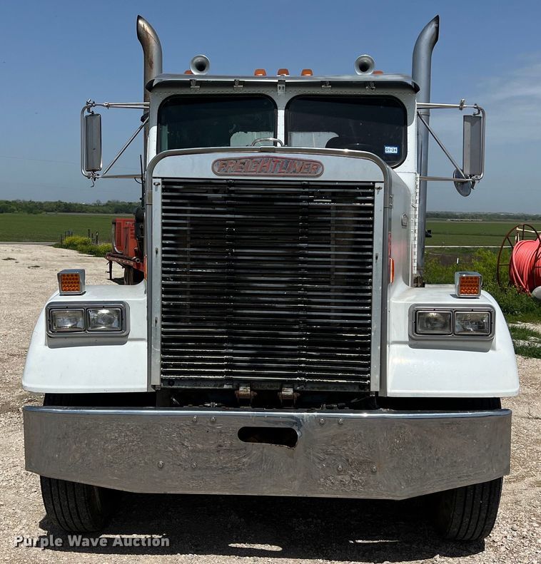 image for item DS2934 1989 Freightliner FLC flatbed truck with Vermeer fluid mixer