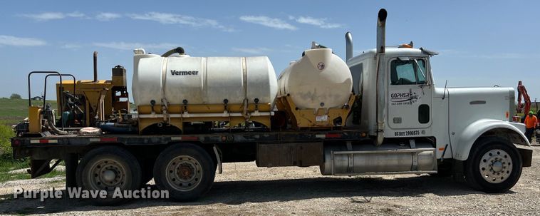 image for item DS2934 1989 Freightliner FLC flatbed truck with Vermeer fluid mixer