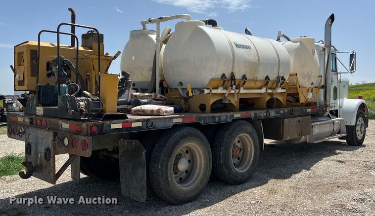 image for item DS2934 1989 Freightliner FLC flatbed truck with Vermeer fluid mixer