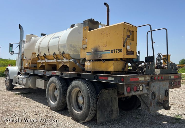 image for item DS2934 1989 Freightliner FLC flatbed truck with Vermeer fluid mixer