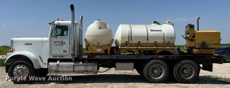image for item DS2934 1989 Freightliner FLC flatbed truck with Vermeer fluid mixer