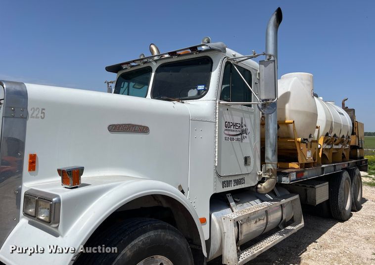 image for item DS2934 1989 Freightliner FLC flatbed truck with Vermeer fluid mixer