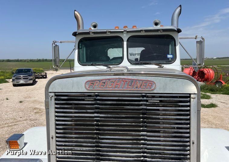 image for item DS2934 1989 Freightliner FLC flatbed truck with Vermeer fluid mixer