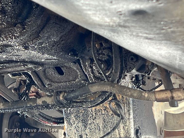 image for item DS2934 1989 Freightliner FLC flatbed truck with Vermeer fluid mixer