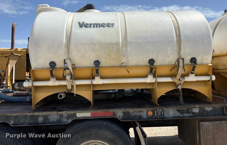 image for item DS2934 1989 Freightliner FLC flatbed truck with Vermeer fluid mixer