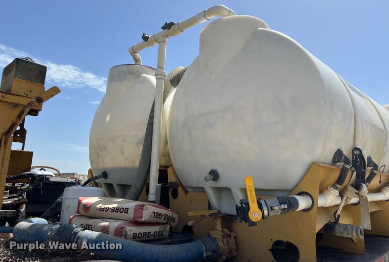 image for item DS2934 1989 Freightliner FLC flatbed truck with Vermeer fluid mixer