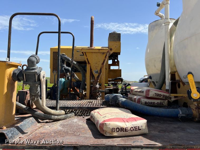 image for item DS2934 1989 Freightliner FLC flatbed truck with Vermeer fluid mixer