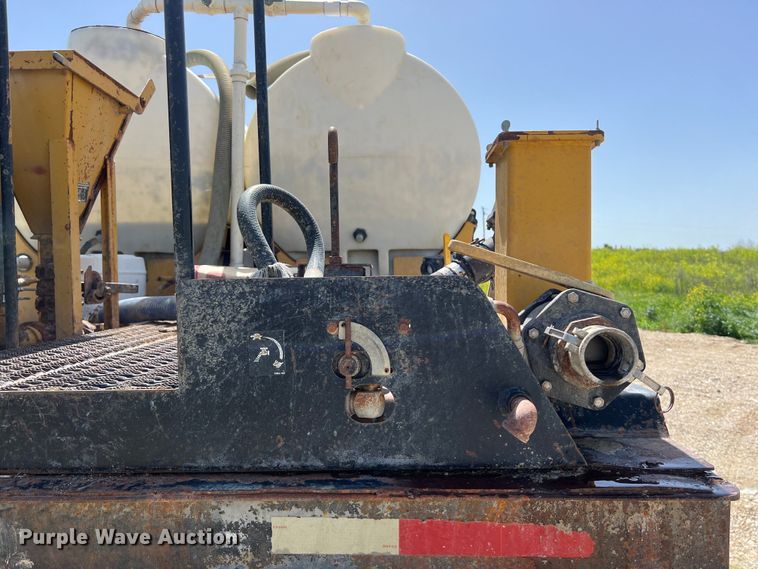 image for item DS2934 1989 Freightliner FLC flatbed truck with Vermeer fluid mixer