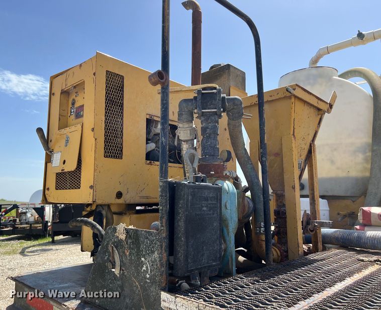 image for item DS2934 1989 Freightliner FLC flatbed truck with Vermeer fluid mixer