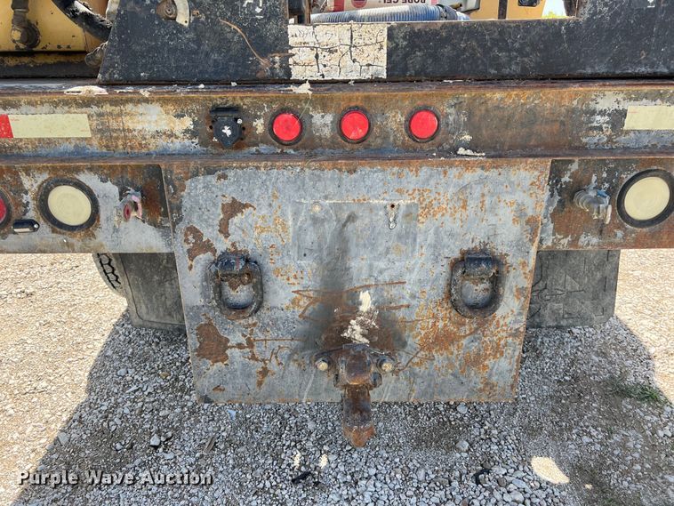 image for item DS2934 1989 Freightliner FLC flatbed truck with Vermeer fluid mixer