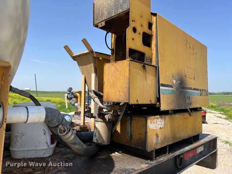 image for item DS2934 1989 Freightliner FLC flatbed truck with Vermeer fluid mixer