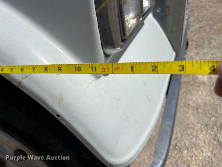 image for item DS2934 1989 Freightliner FLC flatbed truck with Vermeer fluid mixer