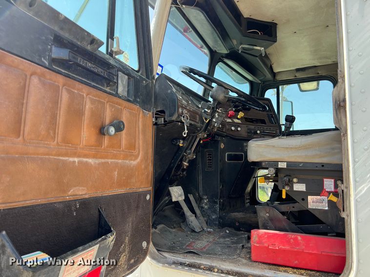 image for item DS2934 1989 Freightliner FLC flatbed truck with Vermeer fluid mixer