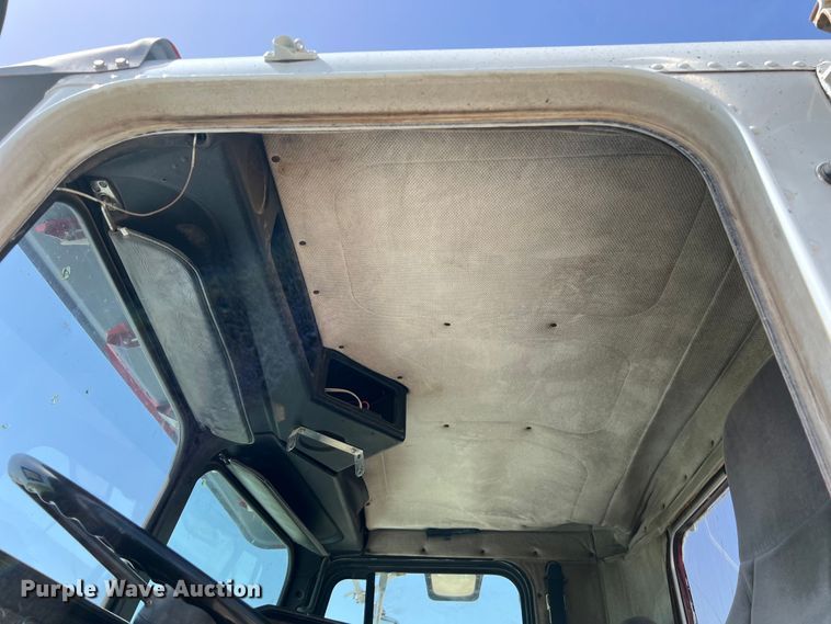 image for item DS2934 1989 Freightliner FLC flatbed truck with Vermeer fluid mixer