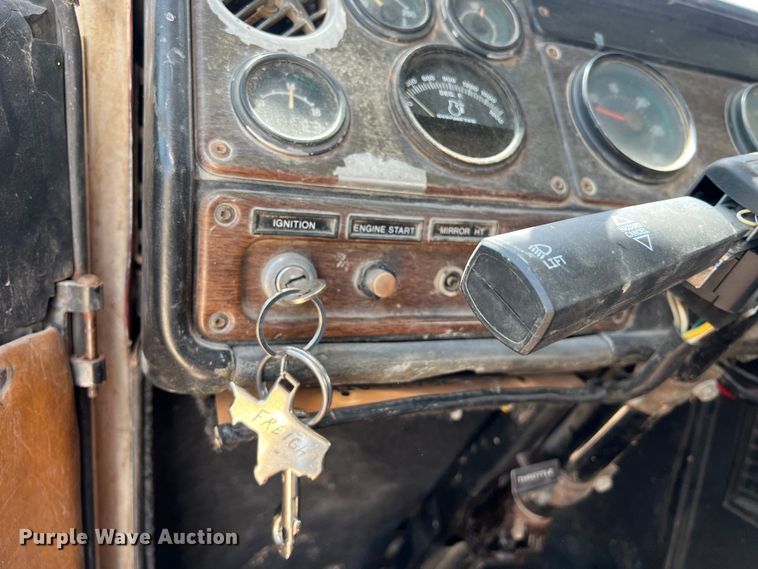 image for item DS2934 1989 Freightliner FLC flatbed truck with Vermeer fluid mixer