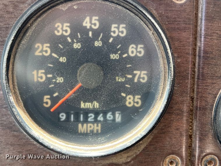 image for item DS2934 1989 Freightliner FLC flatbed truck with Vermeer fluid mixer