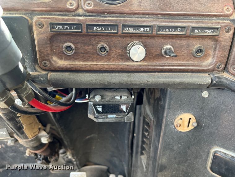 image for item DS2934 1989 Freightliner FLC flatbed truck with Vermeer fluid mixer